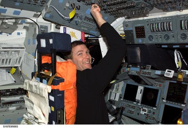 NASA image: Husband seated in the CDR's seat on Columbia's FD during STS-107