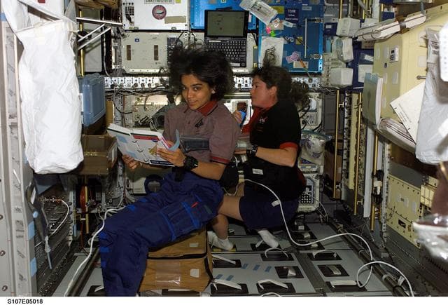 NASA image: Chawla and Clark in the Spacehab RDM during activation procedures on STS-107