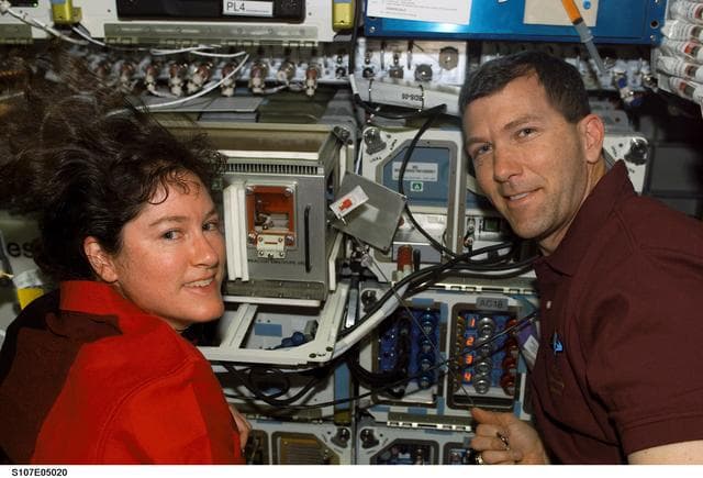 NASA image: Clark and Husband in the Spacehab RDM during activation procedures on STS-107
