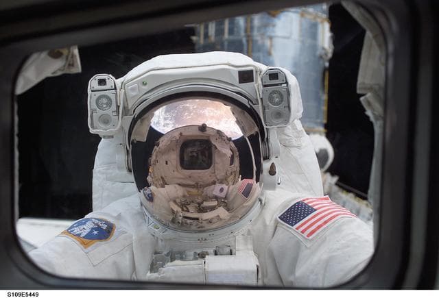 NASA image: View of STS-109 MS Grunsfeld during EVA 1