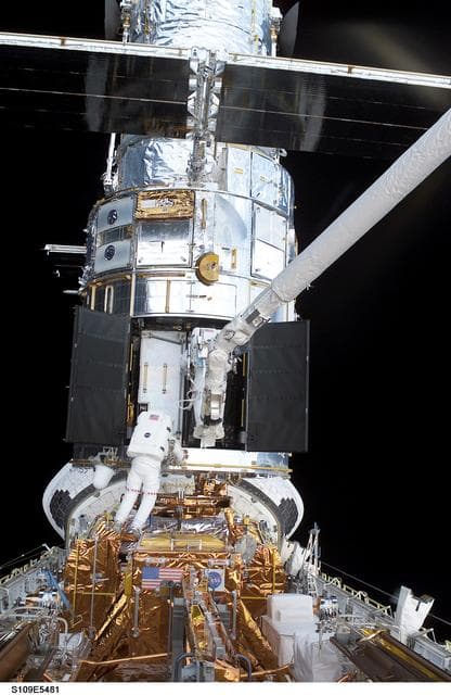NASA image: STS-109 MS Newman and Massimino during EVA 4
