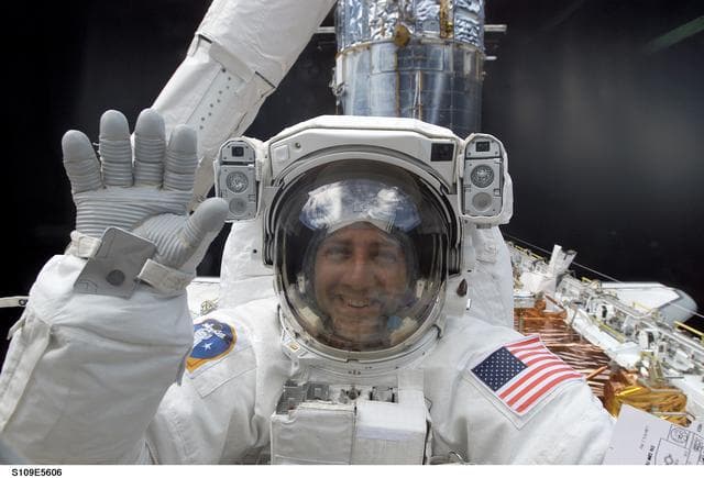 NASA image: EVA 2 - MS Massimino waves to crewmates