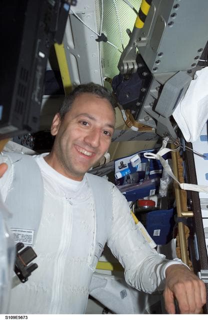 NASA image: MS Massimino on middeck prepares for EVA 4