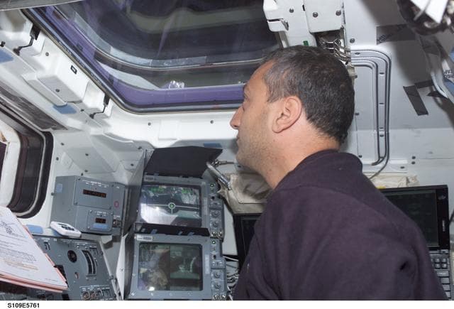 NASA image: MS Massimino on aft flight deck during EVA 5