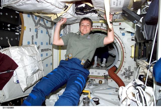 NASA image: Whitson in PMA 2 on the ISS during STS-111 UF-2 cargo transfer OPS