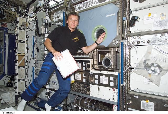 NASA image: Whitson floats next to the MSG in the Destiny U.S. Lab during STS-111 UF-2 docked OPS