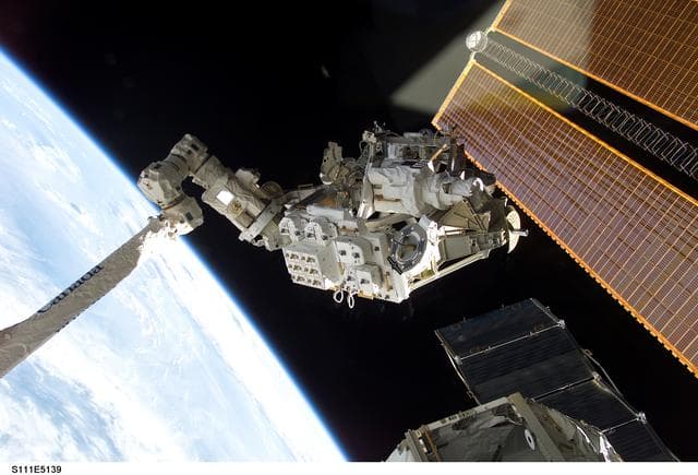 NASA image: MBS grappled to the Canadarm2 SSRMS during STS-111 UF-2 installation OPS on the ISS truss structure