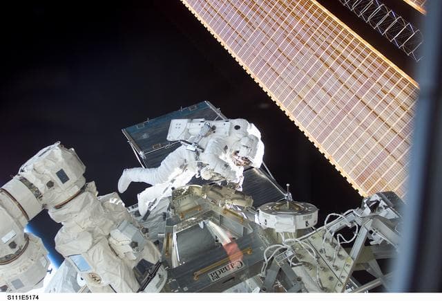NASA image: Perrin works at the MBS on the S0 (S-zero) truss during STS-111 UF-2 EVA 2