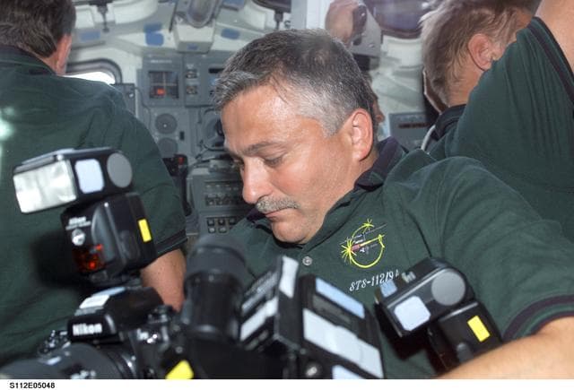 NASA image: STS-112 MS Yurchikhin on aft flight deck