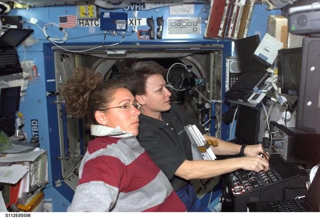 NASA image: MS Magnus and Expedition 5 Science Officer Whitson at SSRMS controls