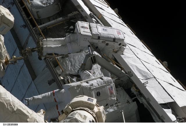 NASA image: MS Sellers and Wolf on S1 truss during EVA 3