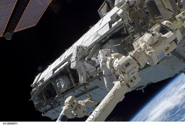NASA image: MS Sellers and Wolf on S1 truss during EVA 3