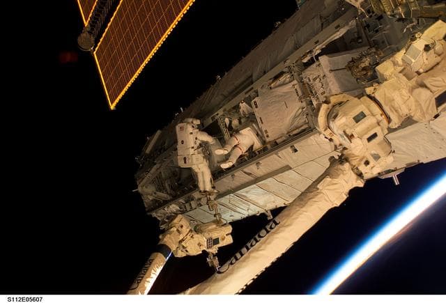 NASA image: MS Sellers and Wolf on S1 truss during EVA 3