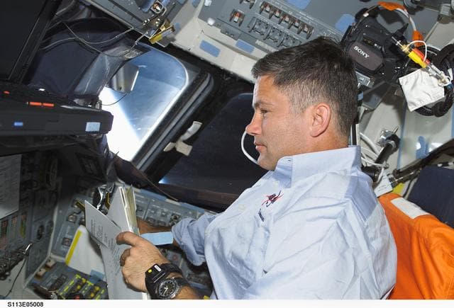 NASA image: Pilot Lockhart works on the FD during STS-113
