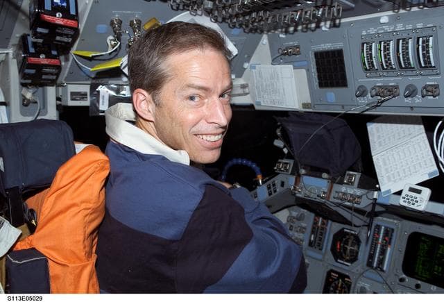 NASA image: CDR James Wetherbee works at CDRs station of FD during STS-113