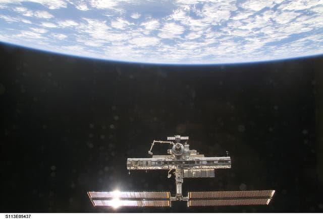 NASA image: Overall exterior views of the ISS during Undocking and Flyaround Operations for STS-113 (11A)
