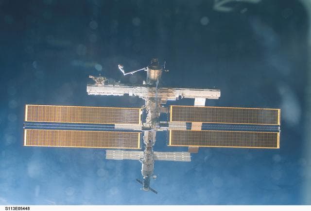 NASA image: Overall exterior views of the ISS during Undocking and Flyaround Operations for STS-113 (11A)