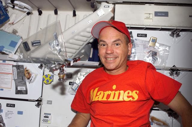 NASA image: Sturckow poses for photo in the FWD MDDK on STS-117 Space Shuttle Atlantis