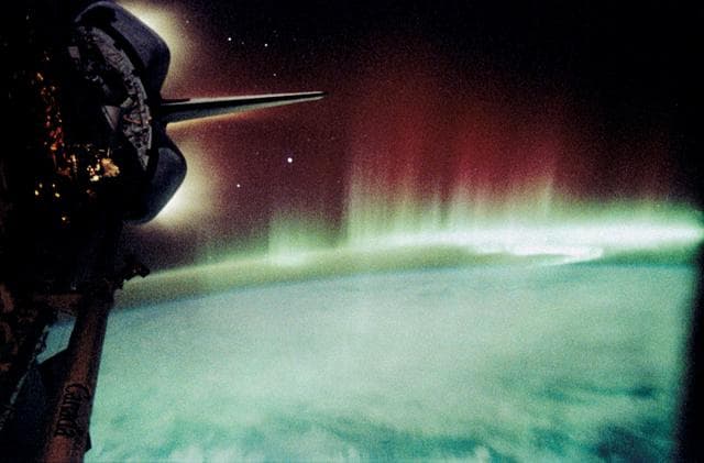 NASA image: Aurora Australis, Spiked and Sinuous Red and Green Airglow