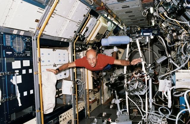 NASA image: STS-40 Mission Specialist (MS) Bagian "flies" through SLS-1 module