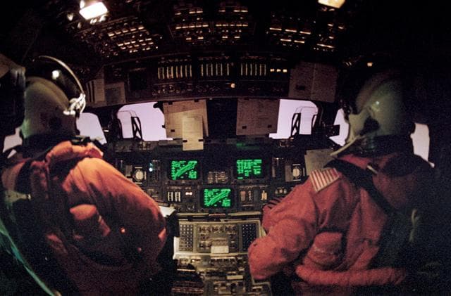 NASA image: STS-42 Commander Grabe and Pilot Oswald at OV-103's controls during reentry