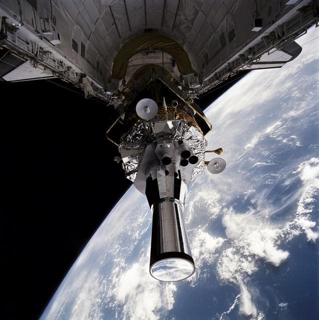 NASA image: STS-44 DSP / IUS spacecraft tilted to predeployment position in OV-104's PLB
