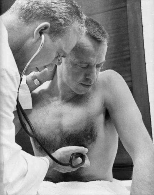 NASA image: Astronaut Alan B. Shepard has his blood pressure and temperature checked