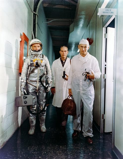 NASA image: Astronaut John Glenn leaving crew quarters prior to launch