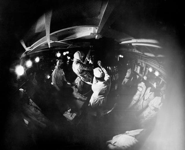 NASA image: Fish-eye view of Astronaut John Glenn insertion into the Mercury Spacecraft