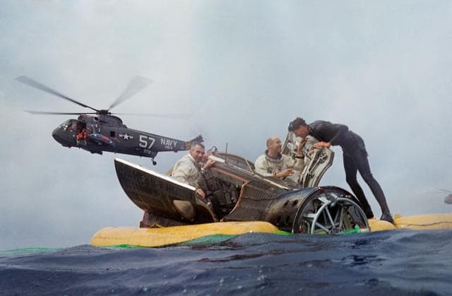 NASA image: ASTRONAUT CERNAN, EUGENE A. - RECOVERY (GT-9A)(S/C IN WATER W/HATCHES OPEN)