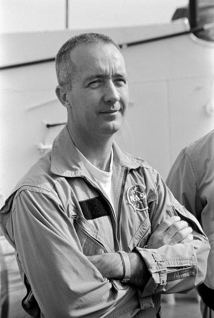 NASA image: Astronaut James A. McDivitt on deck of ship prior to water egress training