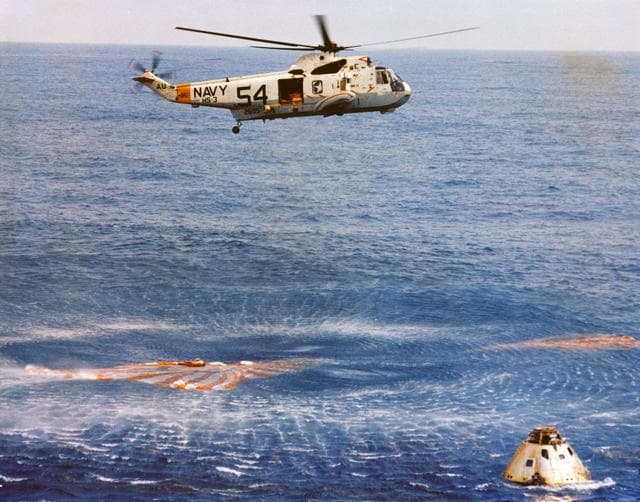 NASA image: Photo - Apollo/Saturn (A/S)-11 - Water w/Helo Hovering Overhead