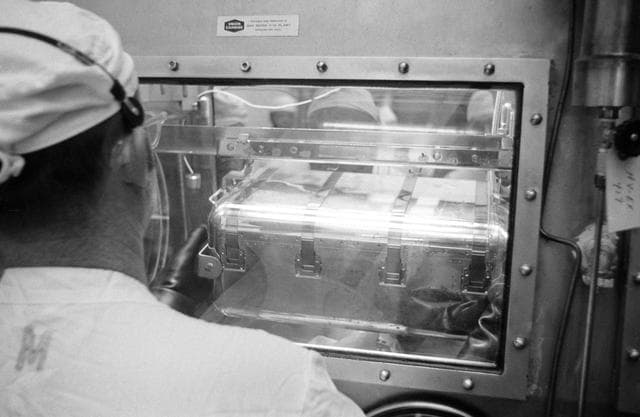 NASA image: First Apollo 11 Sample Return Containers - Unloading - Lunar Receiving Lab (LRL) - MSC
