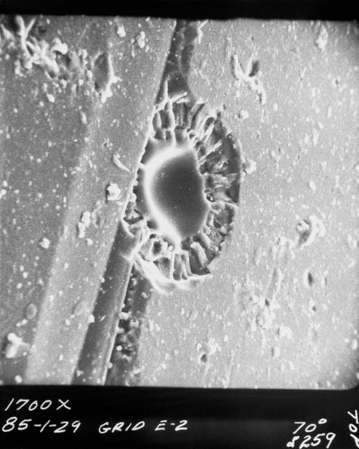 NASA image: Enlarged view of hypervelocity impact of lunar surface material