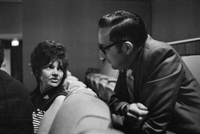 NASA image: Mrs. Lovell in viewing room overlooking FCR