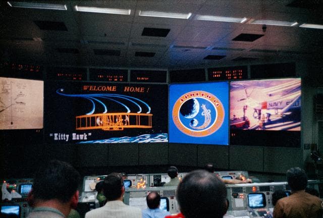 NASA image: Flight Controllers in Mission Control Center during splashdown of Apollo 14