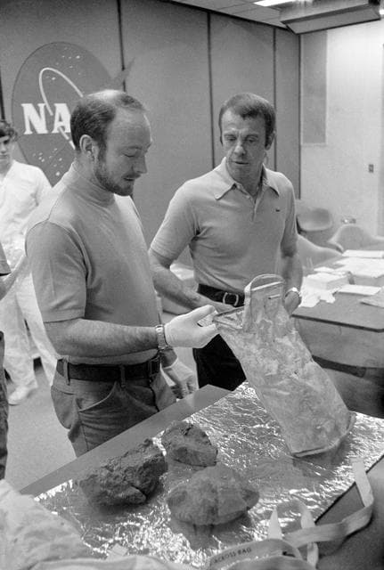 NASA image: Apollo 14 crewmen show off lunar rocks during meeting with newsmen