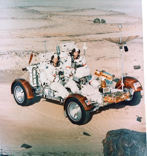Astronauts Young and Duke begin simulated lunar surface traverse at KSC