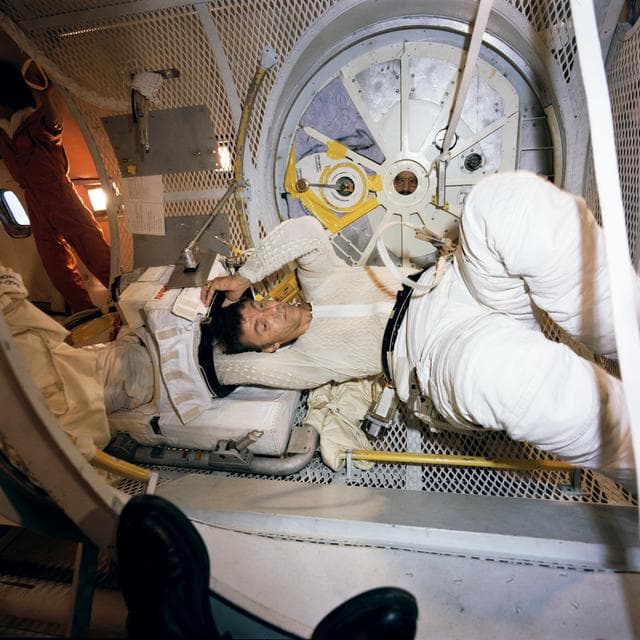 NASA image: Astronaut Joe H. Engle, commander of STS-2, in suit donning/doffing exercise