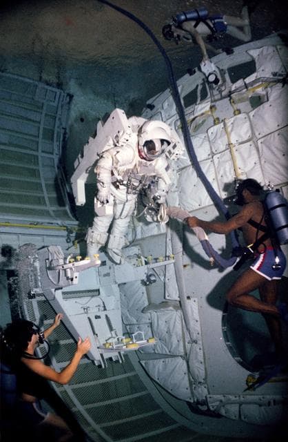 NASA image: Astronaut Bruce McCandless during an underwater test MMU/FSS in bldg 29 WETF