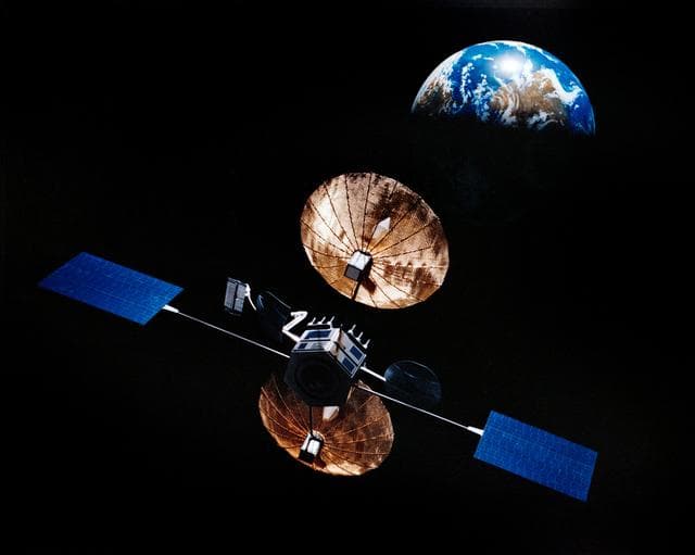 NASA image: Artist concept of satellite in orbit above the earth