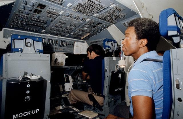NASA image: STS-8 crewmembers during shuttle mission simulation training