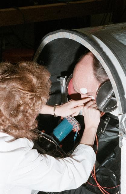 NASA image: Sen. Jake Garn trains in use of equipment for medical experiments