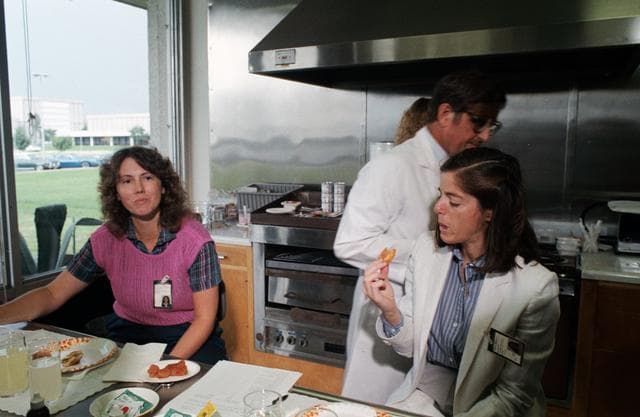 NASA image: Teacher in Space Participants testing space food in orientation session