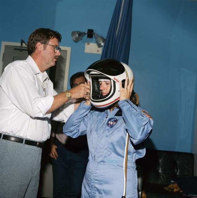 NASA image: Payload Specialist (PS) Christa McAuliffe - Briefing - Launch/Entry Helmets - JSC