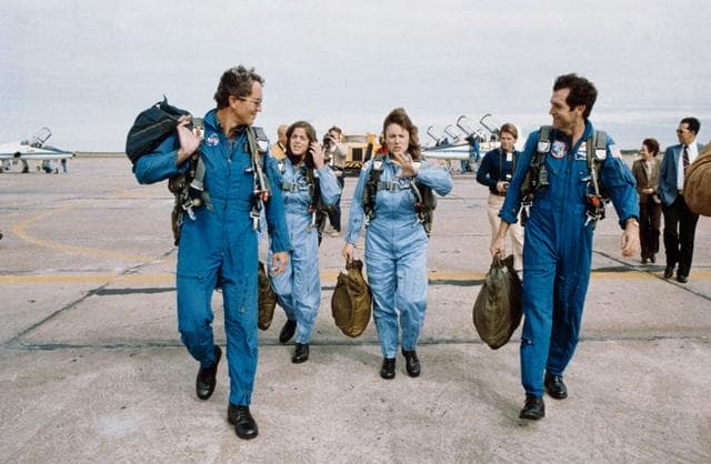 NASA image: STS 51-L crewmembers at Ellington AFB for training flight in T-38