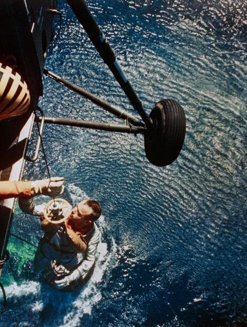 NASA image: Astronaut Alan Shepard is rescued by helicopter at end of MR-3 flight