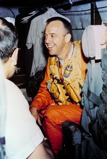 NASA image: Astronaut Alan Shepard onboard helicopter after recovery of Mercury capsule