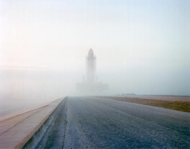 NASA image: STS-32 Columbia, OV-102, rolls through the foggy mist to KSC LC Pad 39A