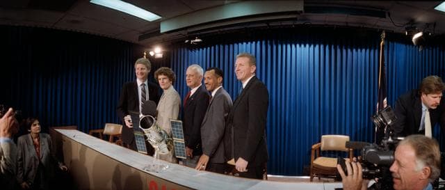 NASA image: STS-31 crewmembers pose for informal portrait after T-30 briefing at JSC